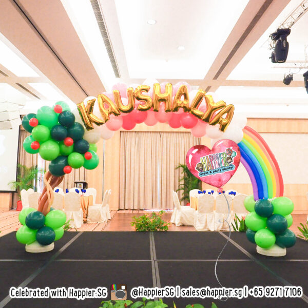 Customised rainbow balloon arch