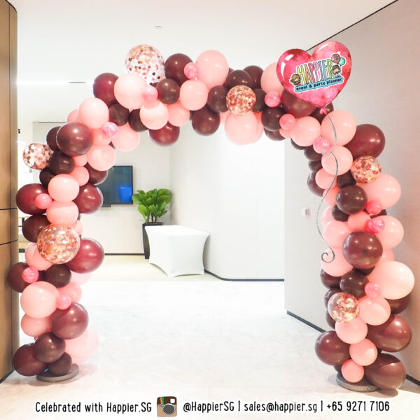 Maroon pink organic balloon arch