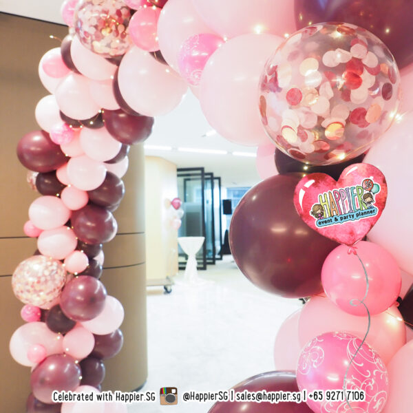 Maroon pink organic balloon arch