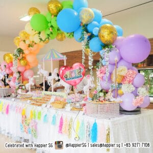 Pastel rainbow organic balloon arch