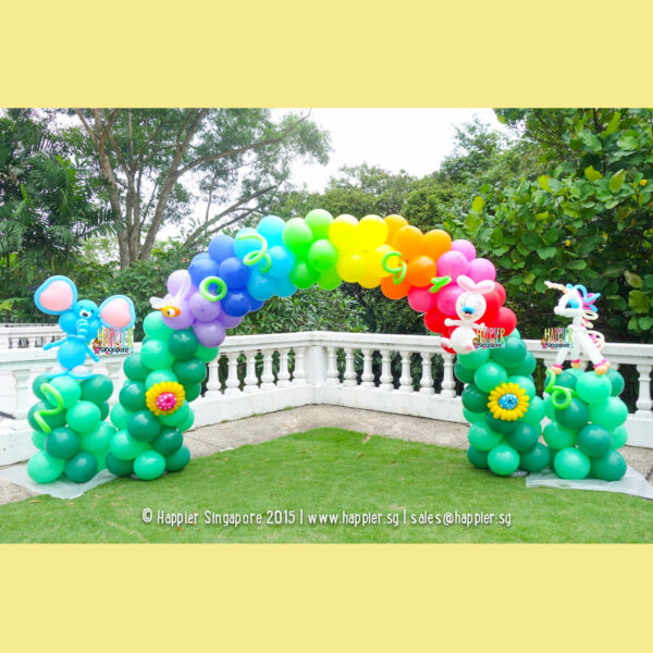 Rainbow garden balloon arch