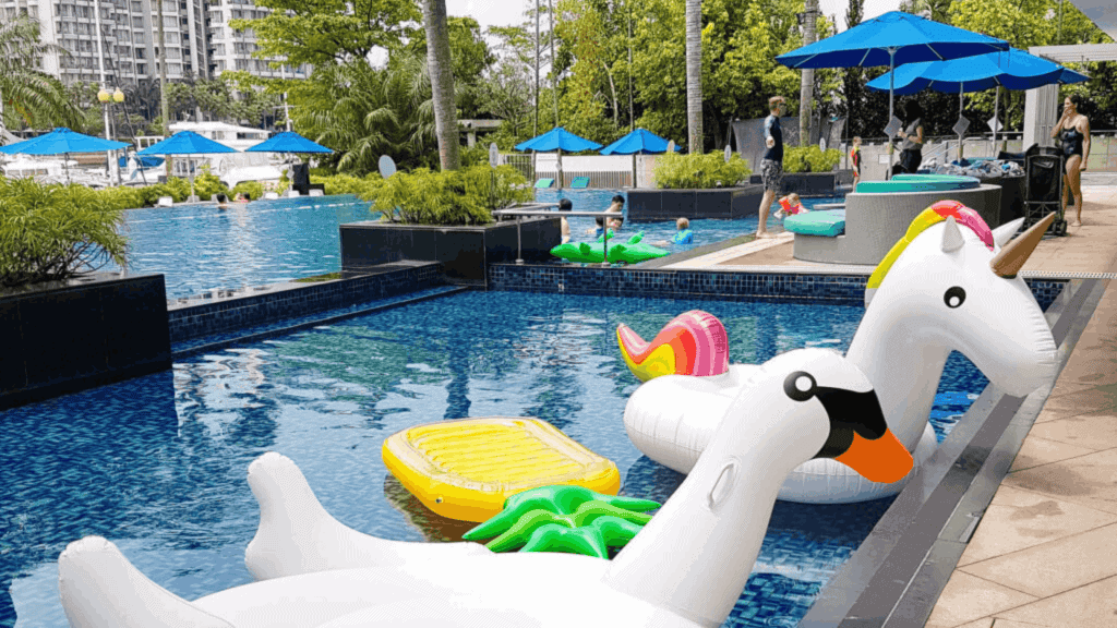 outdoor-team-building-singapore-pool-party-activity Outdoor team building pool party activity in Singapore with inflatable floats